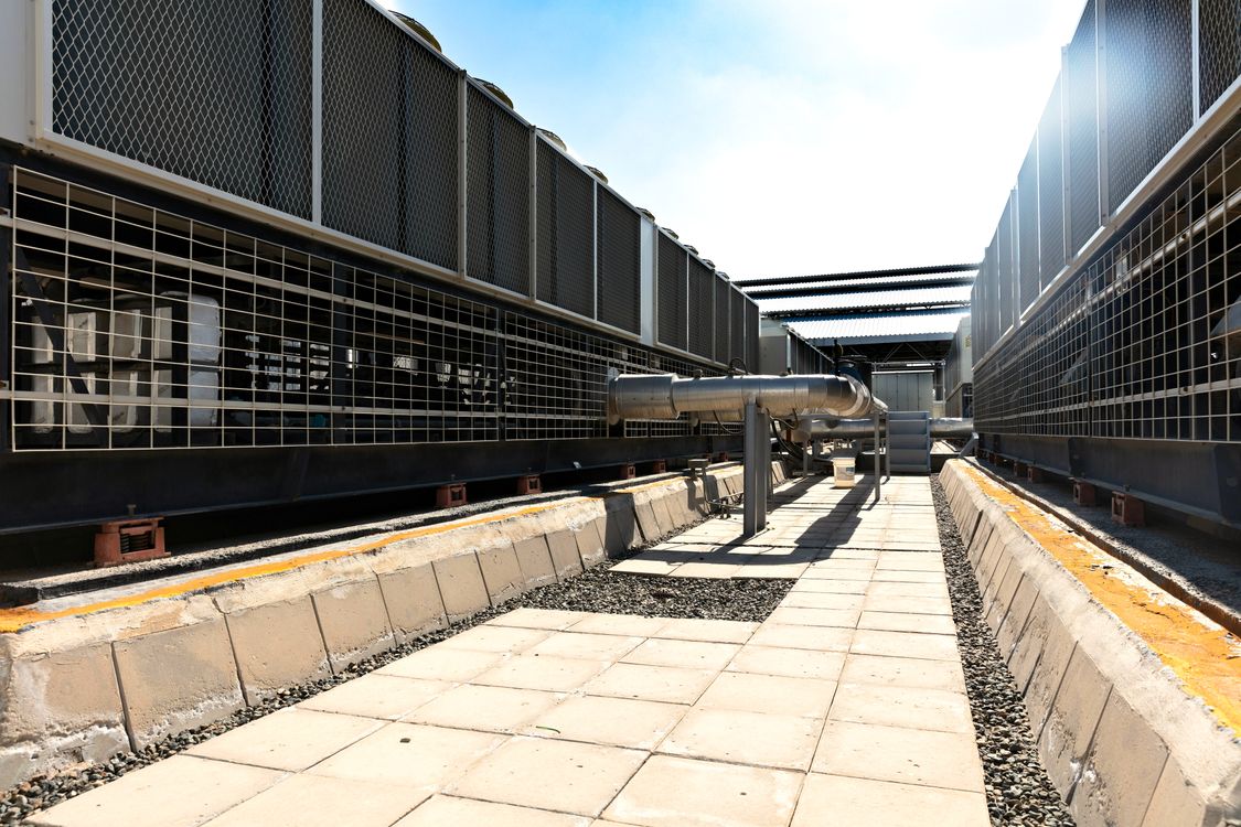 Industrial cooling system with metal pipes for bitcoin mining facility