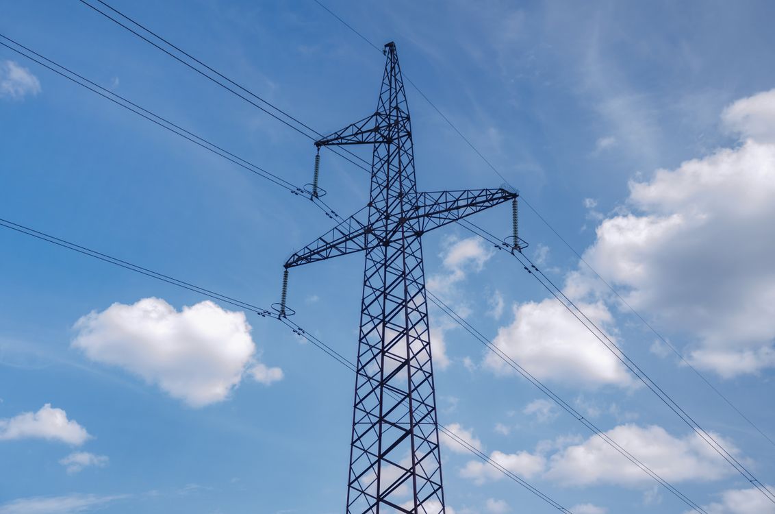 High voltage transmission tower representing power purchase agreement infrastructure