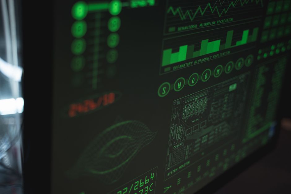 Computer displaying monitoring and data analytics dashboard for mining operations