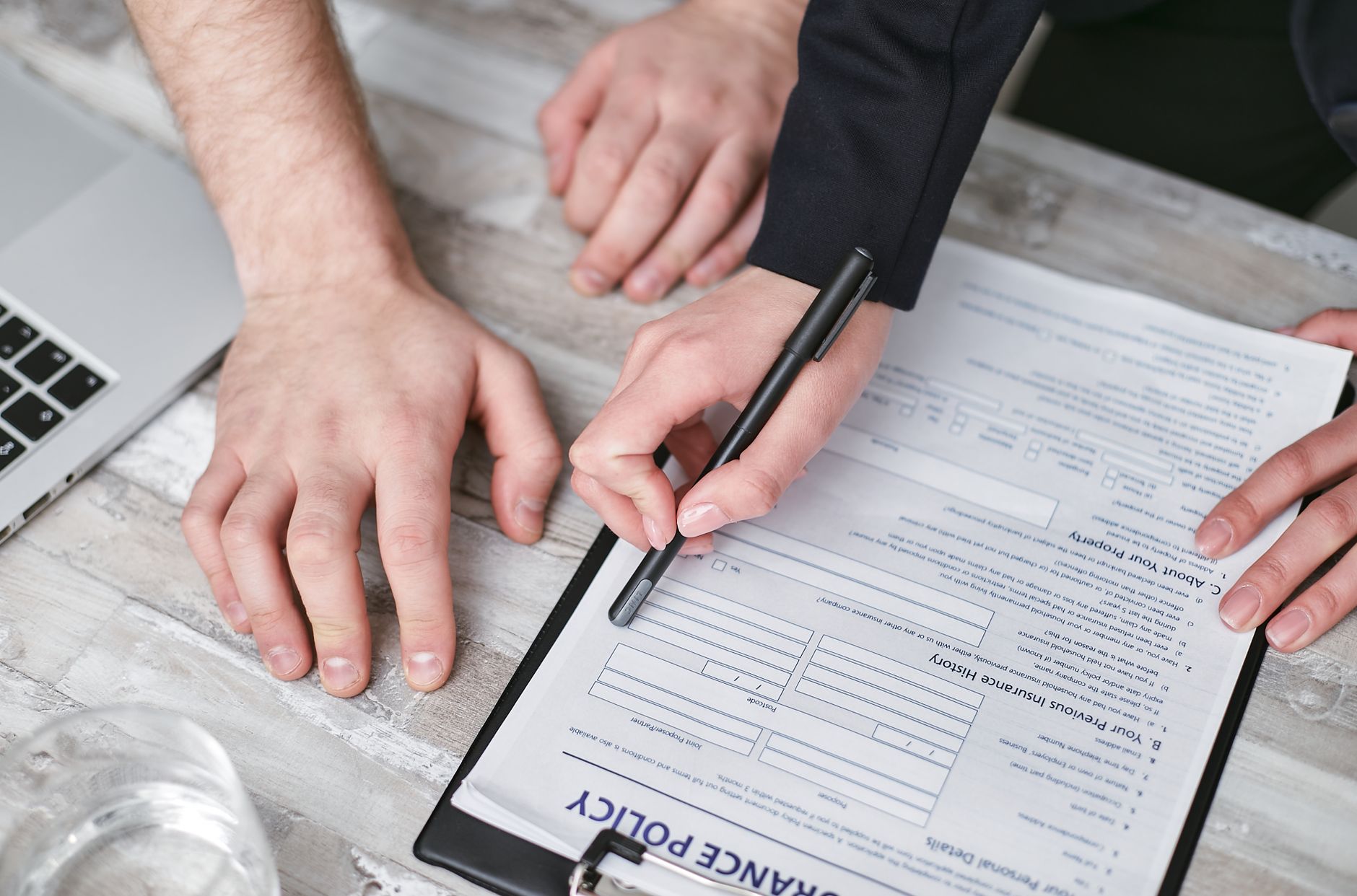 Insurance documents and policy papers for a Bitcoin mining operation covering property, liability, and business interruption
