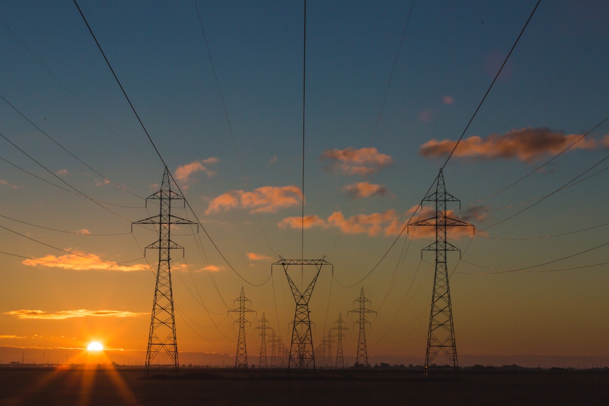High voltage transmission towers and power grid infrastructure for Bitcoin mining interconnection