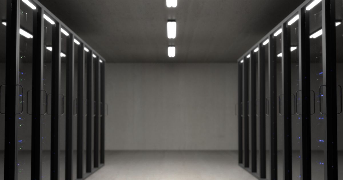 Server room cooling infrastructure with blue LED lighting representing ASIC cooling technology