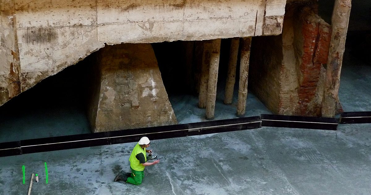 Concrete foundation and excavation work at a construction site